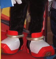 Shadow mascot suit feet close up