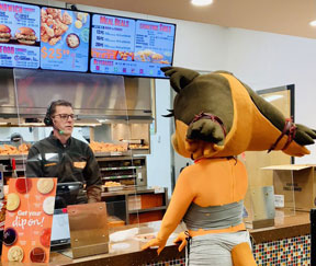 Sticks Mascot at Popeyes