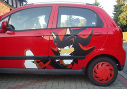 Shadow on a Red Car