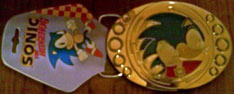 Spinning belt buckle with tag