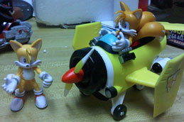 Tails figure comparison photo