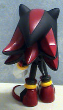 Shadow action figure faces back